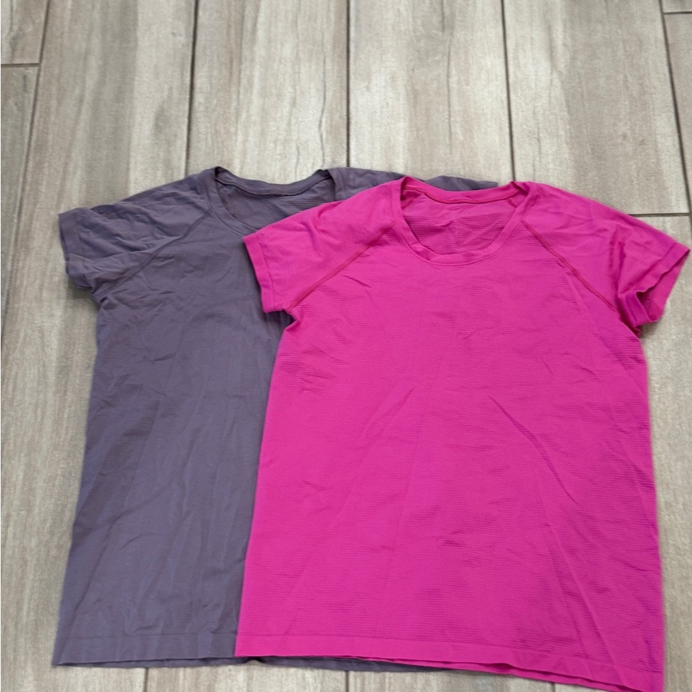 Pink and purple bundle of Lululemon swiftly tech T-shirts
